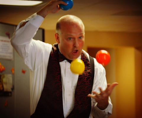 Jerry of Mid-MO Magic juggling multicolored balls