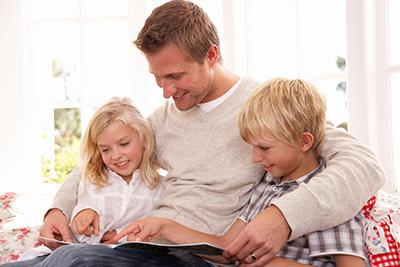 Dad and Kids Reading Together