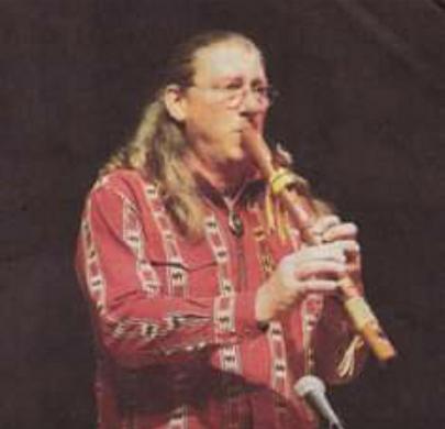 Robert Roe the Osage Wind Rider playing one of his homemade Native American flutes.